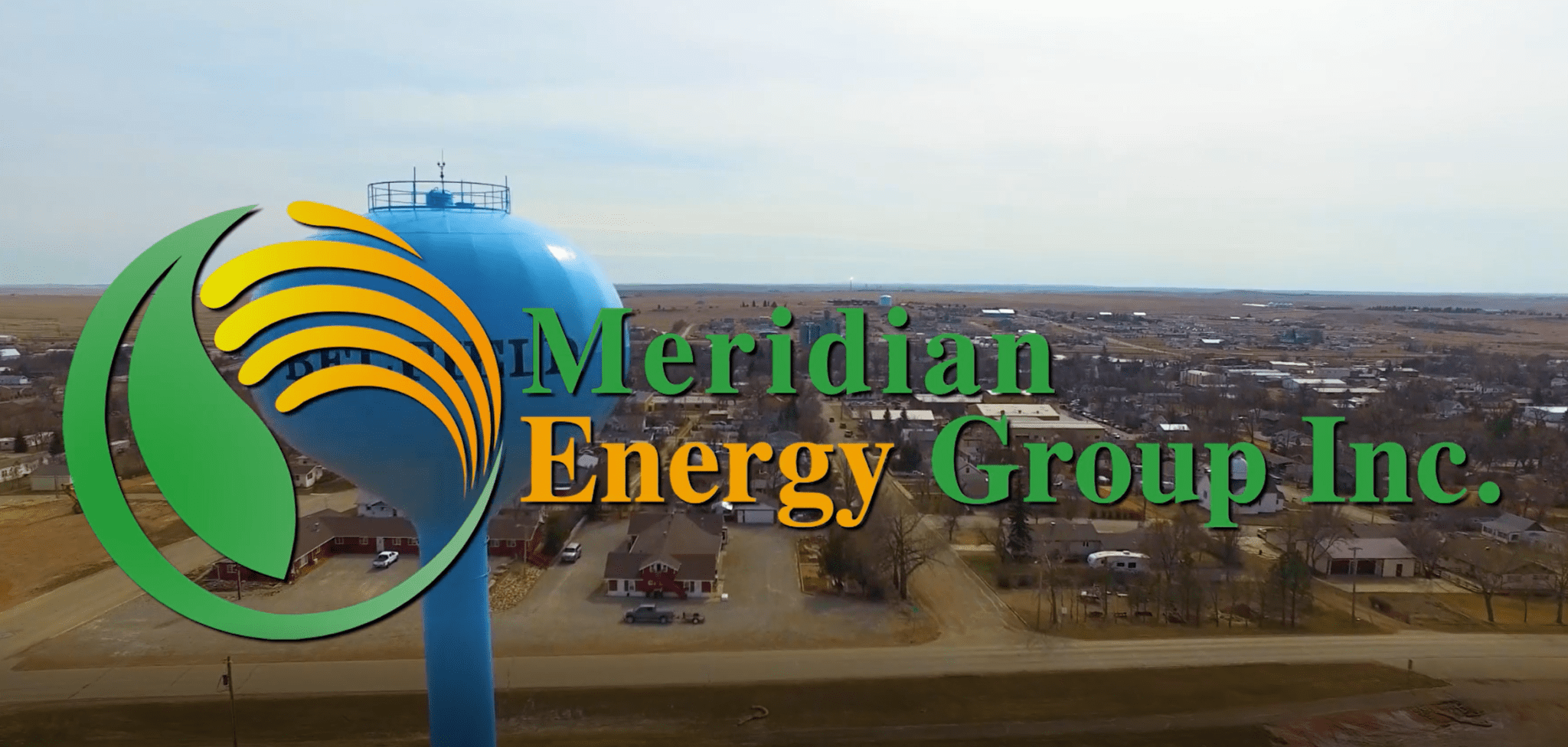 Meridian Energy Group Inc. Logo over Belfield, North Dakota